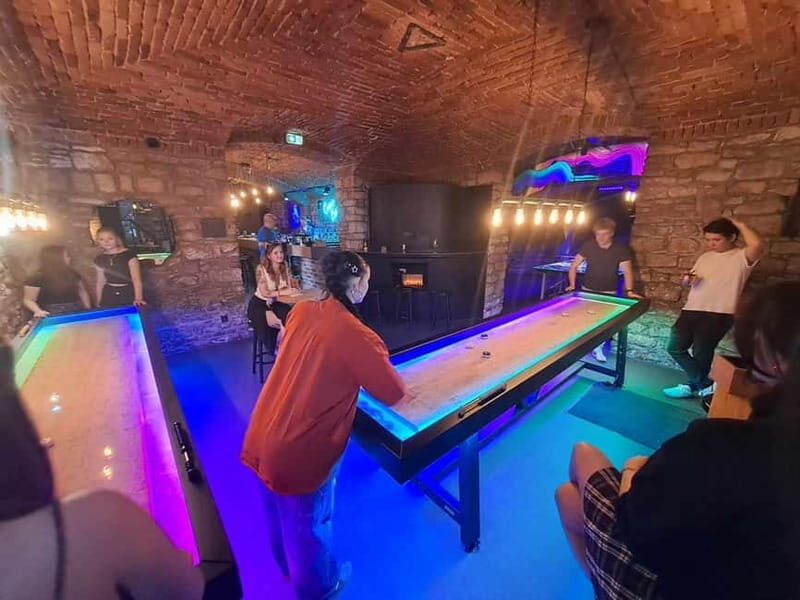 Crew Bar Prague: Open bar, ping pong or shuffleboard game - How your 60 minutes of UV ping pong or shuffleboard plays out