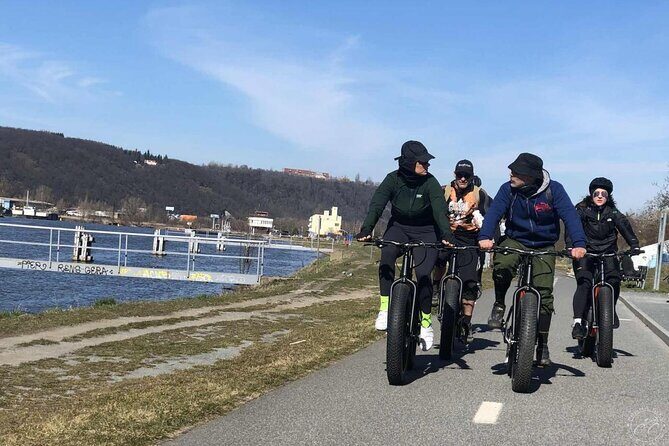 FAT TIRE E-BIKE GREAT TOUR - river, parks & panoramic views tour - Cernin Palace and Lennon Wall: history and modern Prague in the same pocket