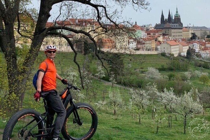 FAT TIRE E-BIKE GREAT TOUR - river, parks & panoramic views tour - Charles Bridge and the Kafka museum fountain: iconic Prague, quickly