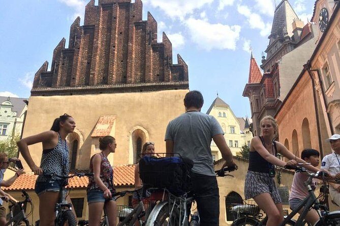 Full-Day All-in-One Bike Tour of Prague (private small group) - Charles Bridge and the river-crossing vibe