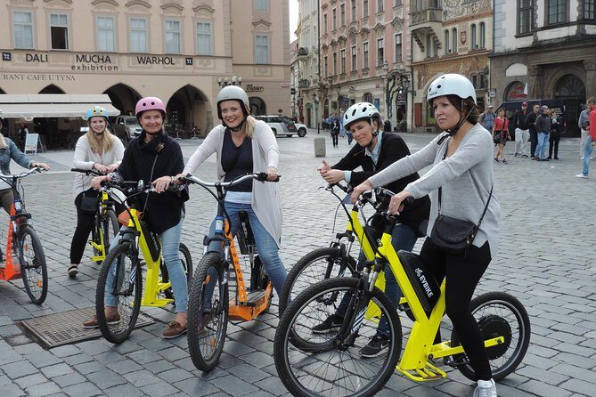 Grand City Tour of Prague on Cruiser e-Bikes or e-Scooters - Charles Bridge and the Prague “photo stop” rhythm