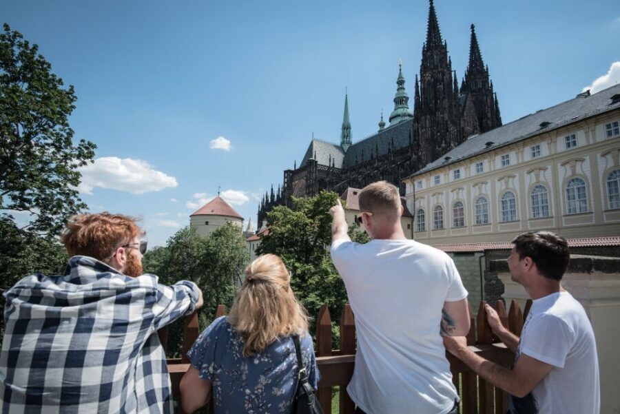 Prague: Castle Grounds & Highlights Walking Tour small-group - Old Royal Palace exterior colors: why the walls matter