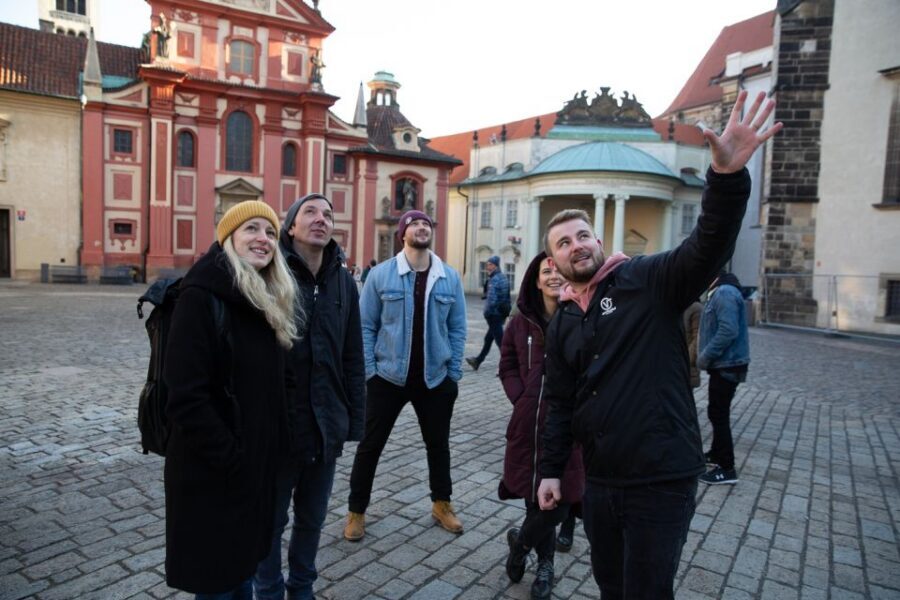 Prague: Castle Grounds & Highlights Walking Tour small-group - St. George Basilica and the castle district pacing