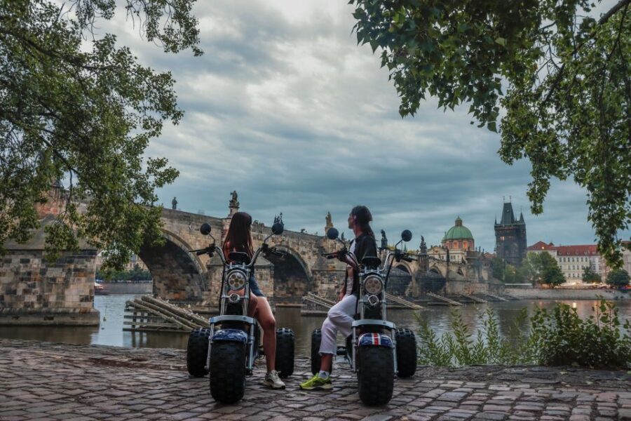 Prague City sightseeing in Night Trike Tour - John Lennon Wall and Charles Bridge: Street Art and River Night Energy