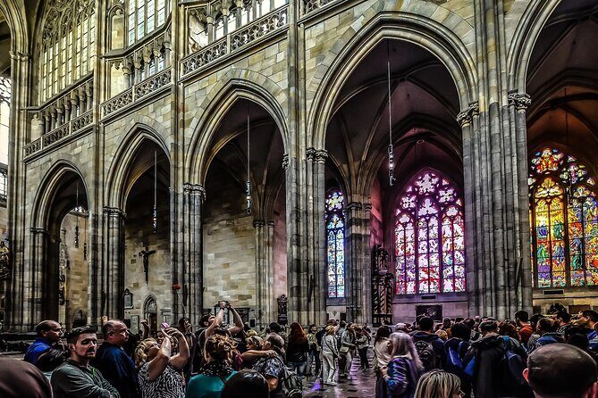 Prague DeLuxe Tour: Views, Hidden Gems, Tastings & River Cruise - Prague Castle gates, St. Vitus Cathedral views, and your Lobkowicz toast
