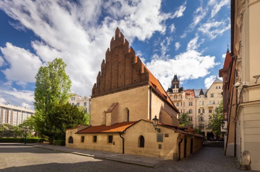 Prague: Old Town Highlights Private Guided Walking Tour - Heading toward the river: Vltava views and WWII survival context