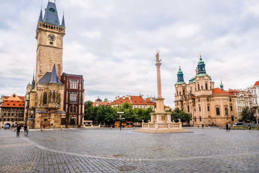 Prague: Old Town Square and Astronomical Clock Audio Guide - Starting Point: Old Town Clock vs. Get Prague Guide Office