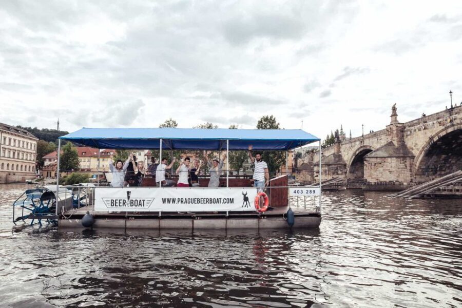Prague: Private Cycle Boat River Tour with Beer or Prosecco - Meeting the crew: the captain, the guide, and the pink-shirt clue