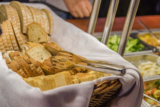 Prague: Sightseeing Boat Cruise with Buffet Dinner - How the buffet dinner works while the city rolls by