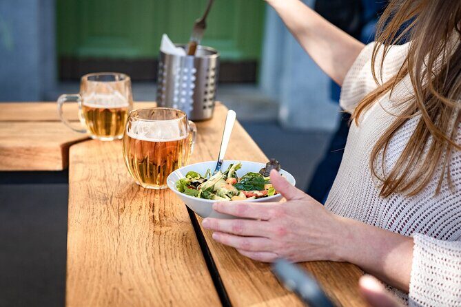 Prague Snack & Stroll: Private Food Tour with Your Local Buddy - Stop 5 across Štvanická lávka: a modern bridge with a river view