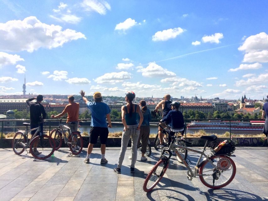 Prague: Stunning Viewpoints, Castle, City & Park Bike Tour - Starting at PRAHA BIKE: Gear, headphones, and a smooth launch