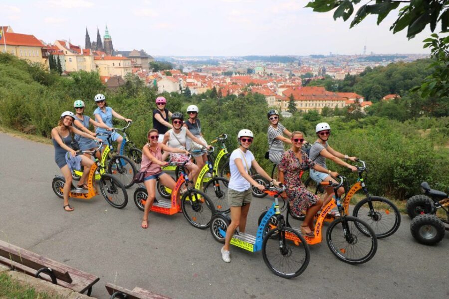 Prague: Tour by Electric Scooter or Cruiser eBike - John Lennon Wall, Kampa, Charles Bridge, and the Kafka-Linked Stops