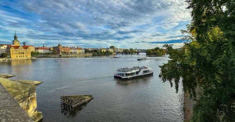 Prague: Vltava River Sightseeing Cruise - The modern electric boat: indoor comfort, outdoor photos, and real sightlines